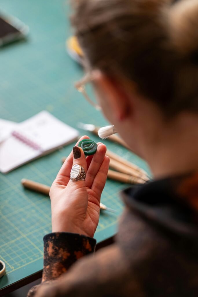 Amsterdam jewelry maker Vera working at her studio